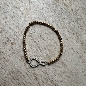 Infinity charm beaded bracelet